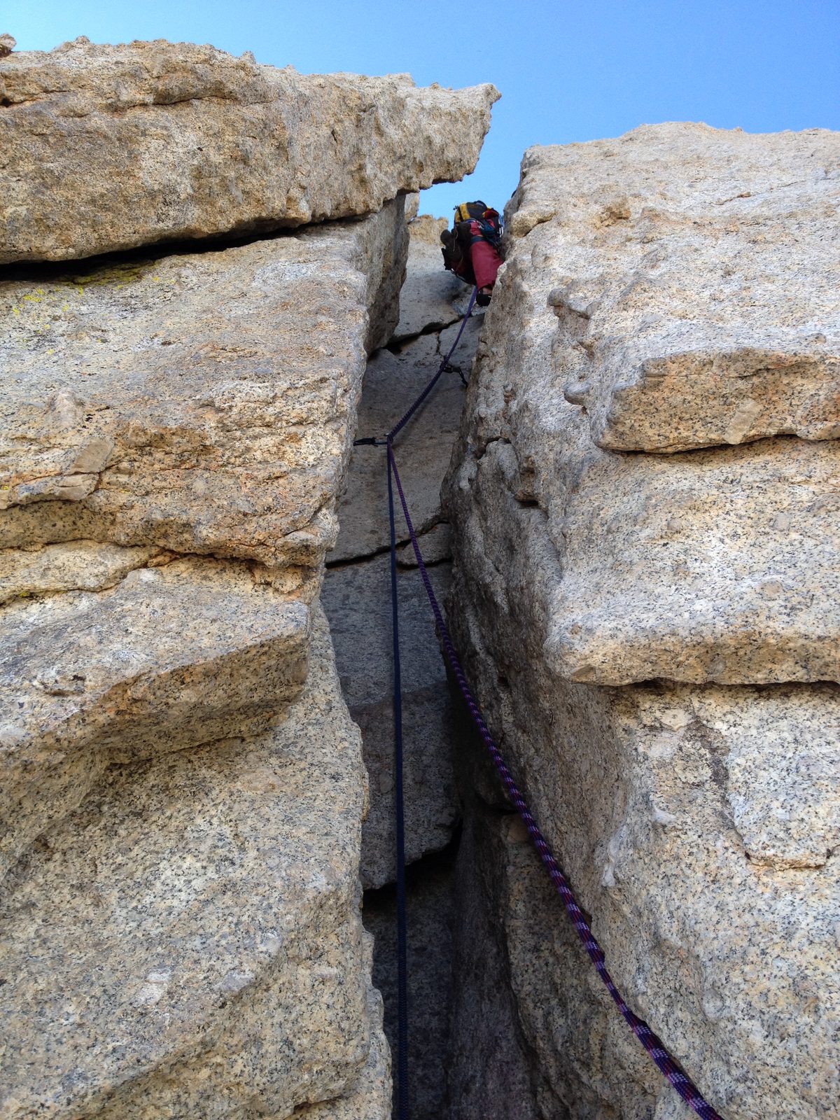 John moving up out of the chimney and back onto more exposed terrain. 