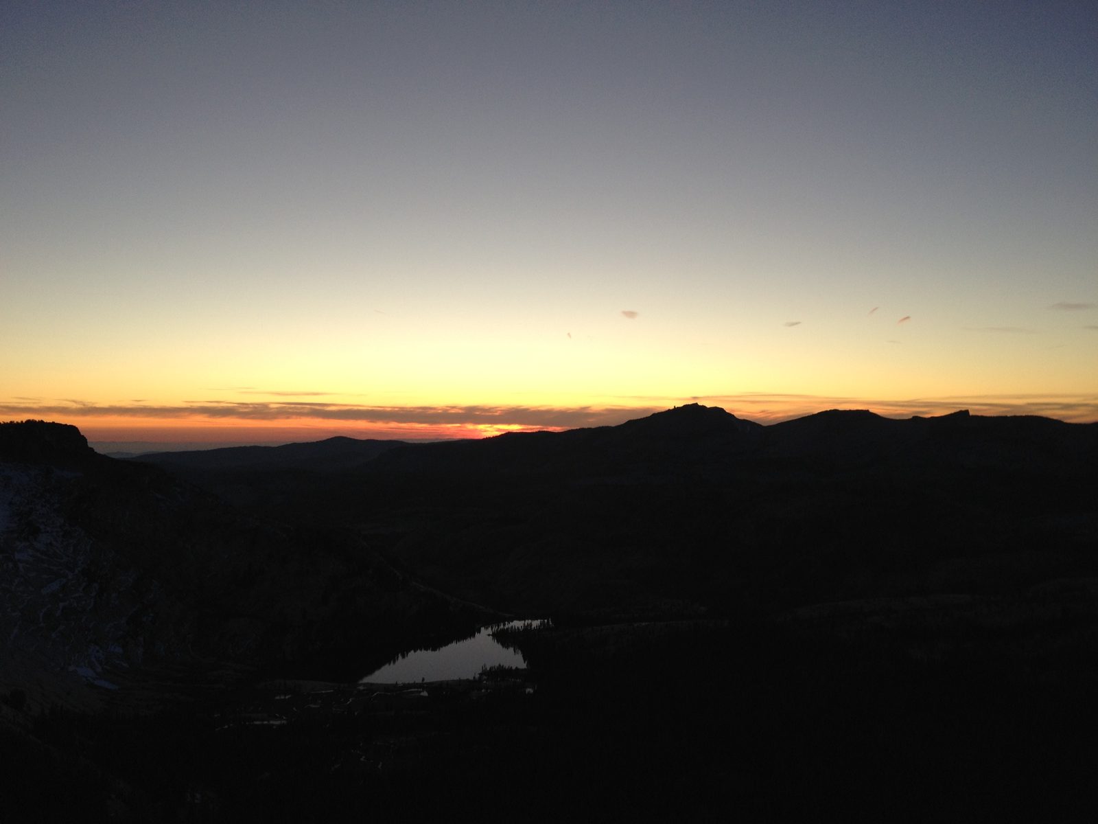 We enjoy the beginning of the evening hiking down the sandy, crumbling western slopes of Cathedral Peak.