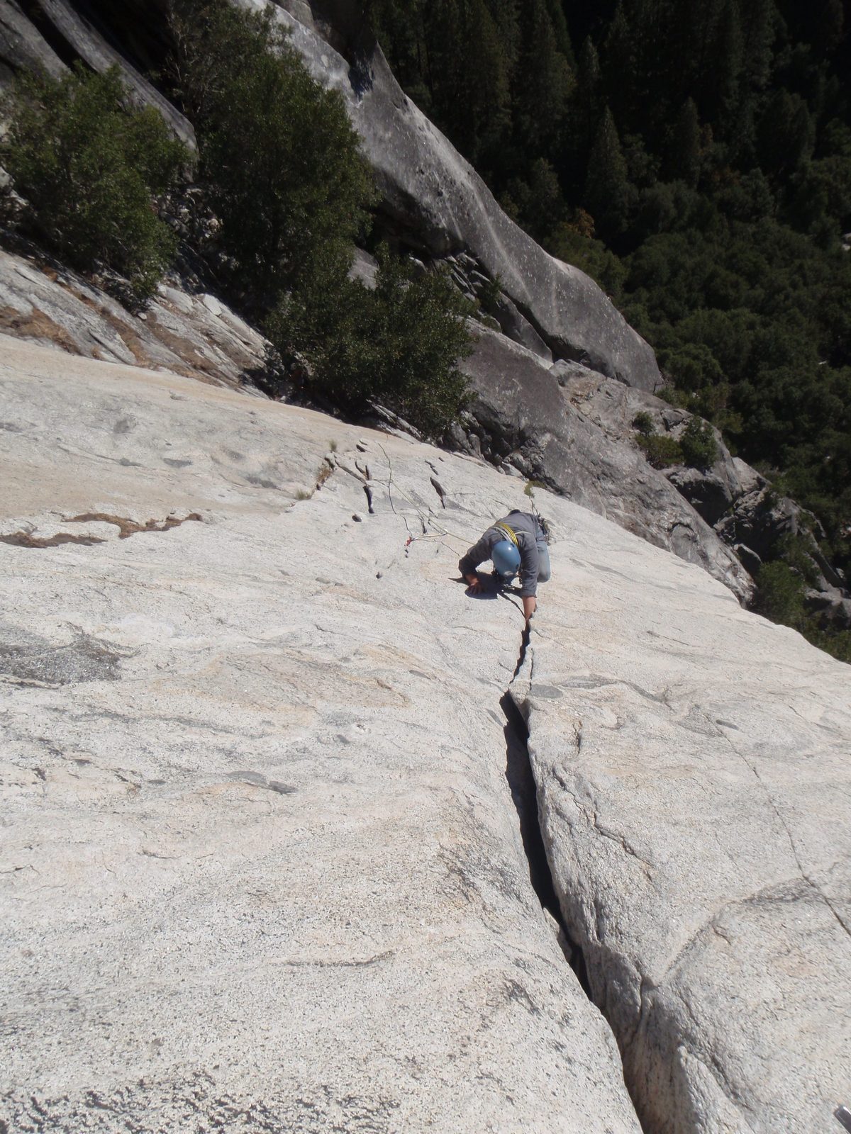 Marlin throwing in a hand jam on pitch 3 of Super Slide (5.9).