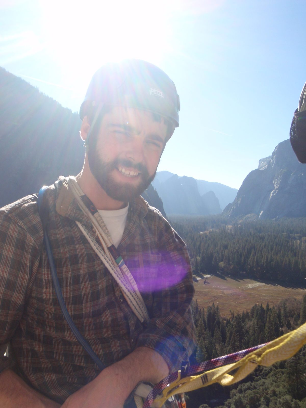 Alex, at belay station 3, waiting to rappel on Super Slide (5.9)