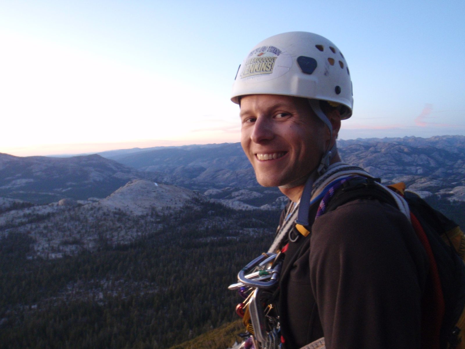 John at the summit of Cathedral Peak, as the sun sets.