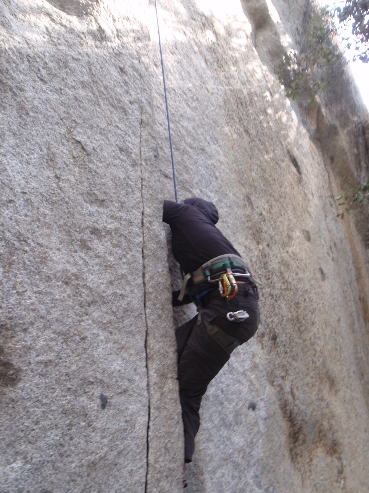 Monica cranking on Generator Crack (5.10c).