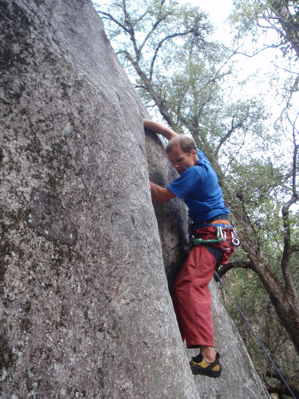 Hooking a finger lock and starting to transition to a lieback.