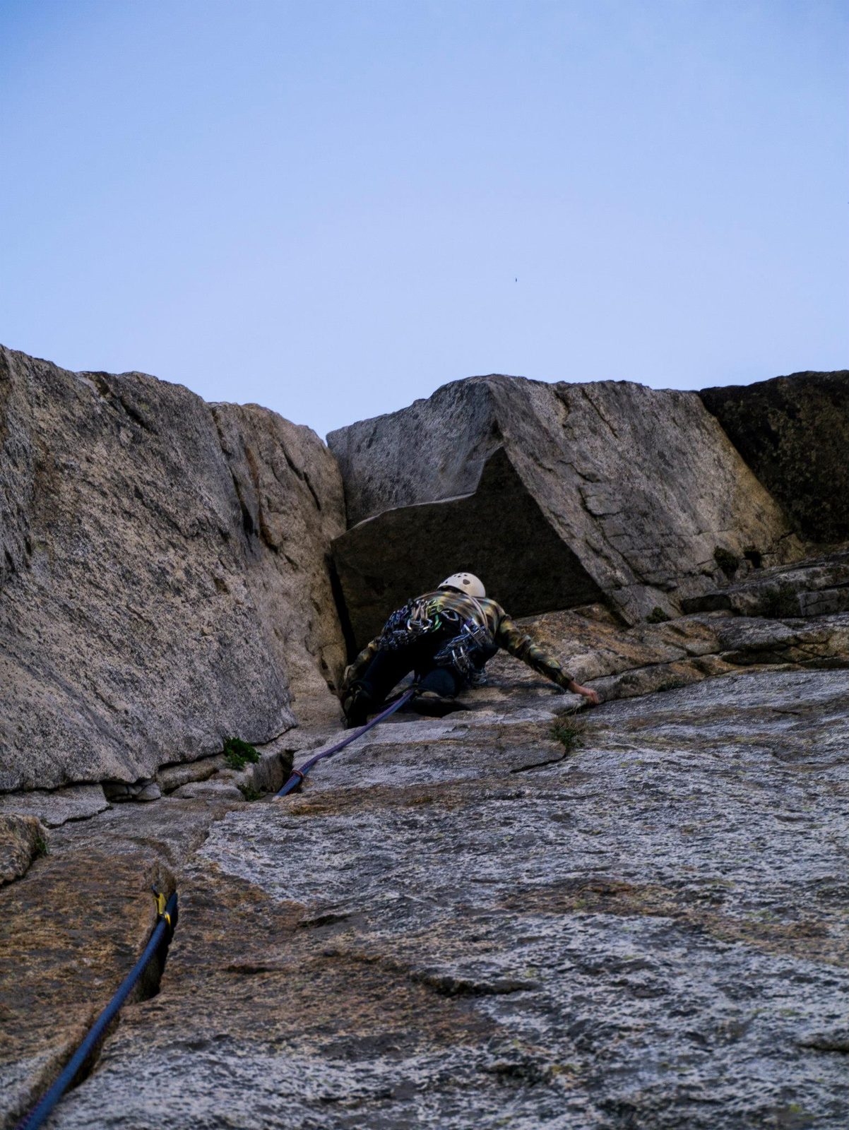 John climbing up pitch 3 through a beautiful section of hand crack to a roof.
