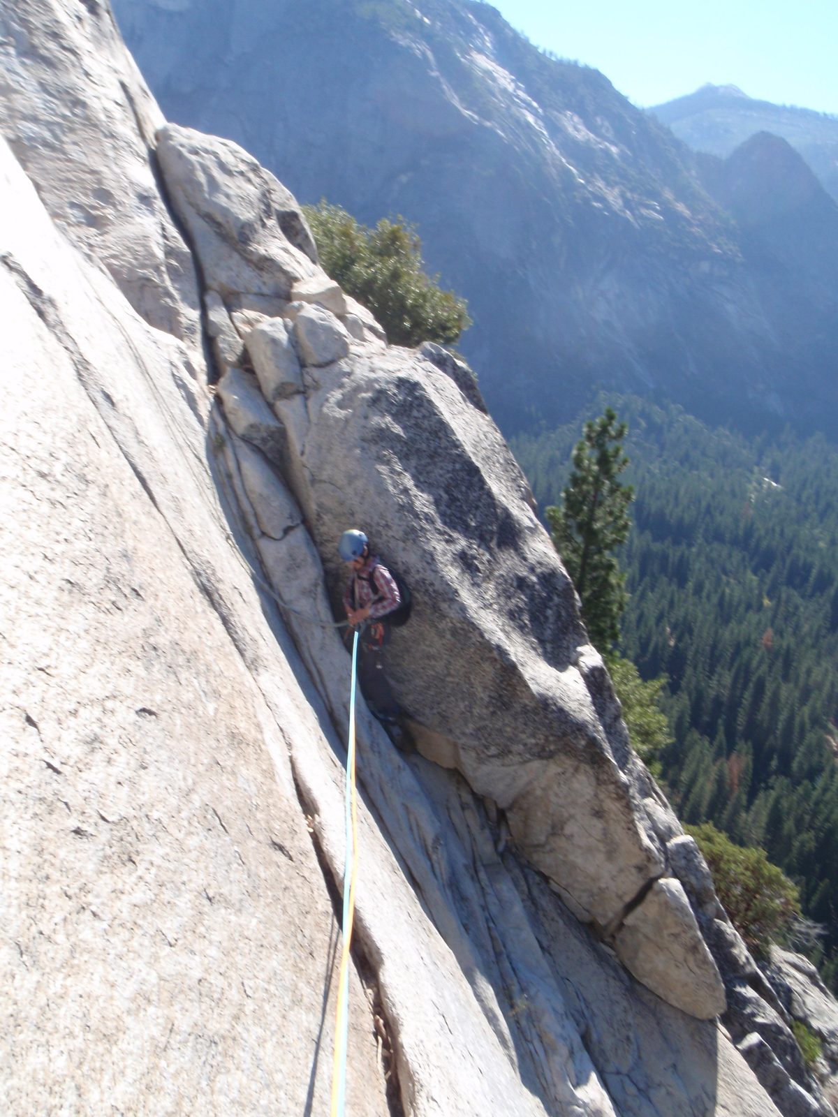 Monica, clipping in to the fixed rope swing (the white rope coming from above). The blue and...