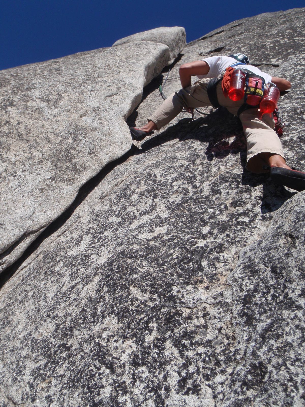 Beach working his way up a lieback on pitch 12.