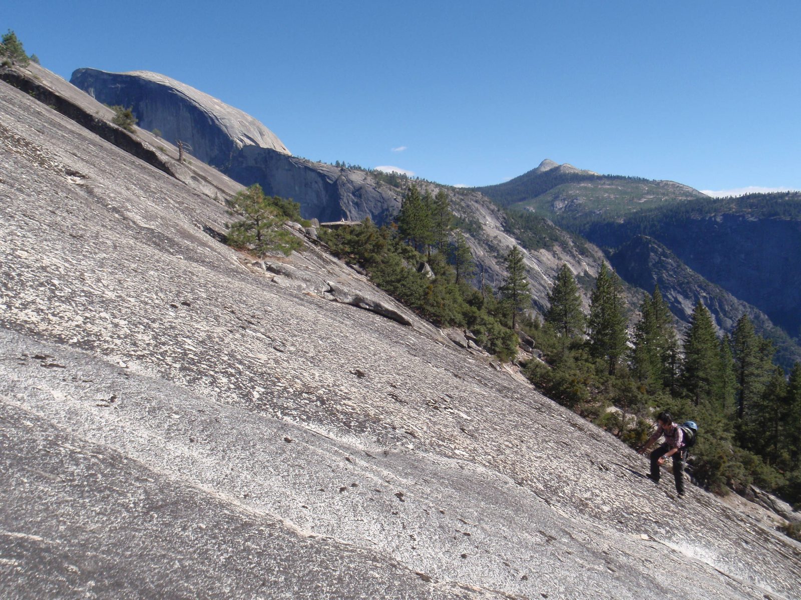 Half Dome, just coming into view from behind the slabs leading up to North Dome.