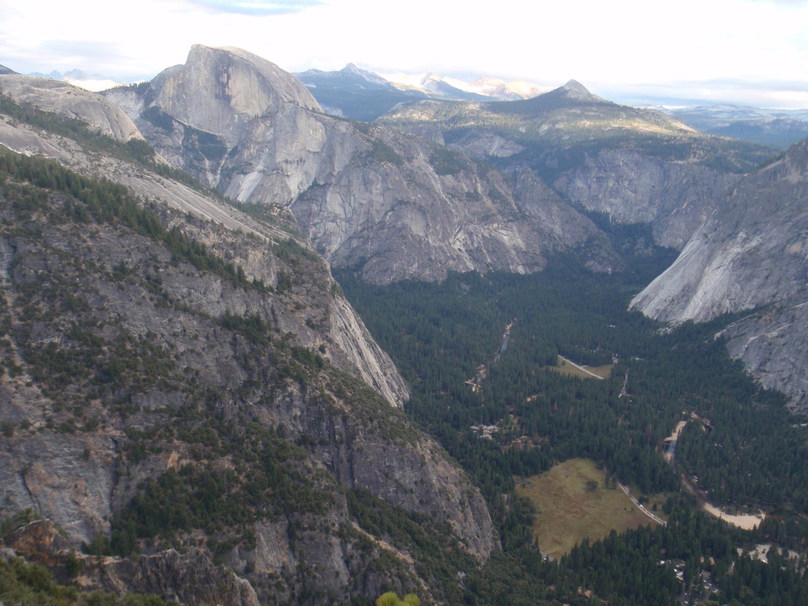 Half Dome and most of Yosemite Village, including a very oblique view of Royal Arches at the...