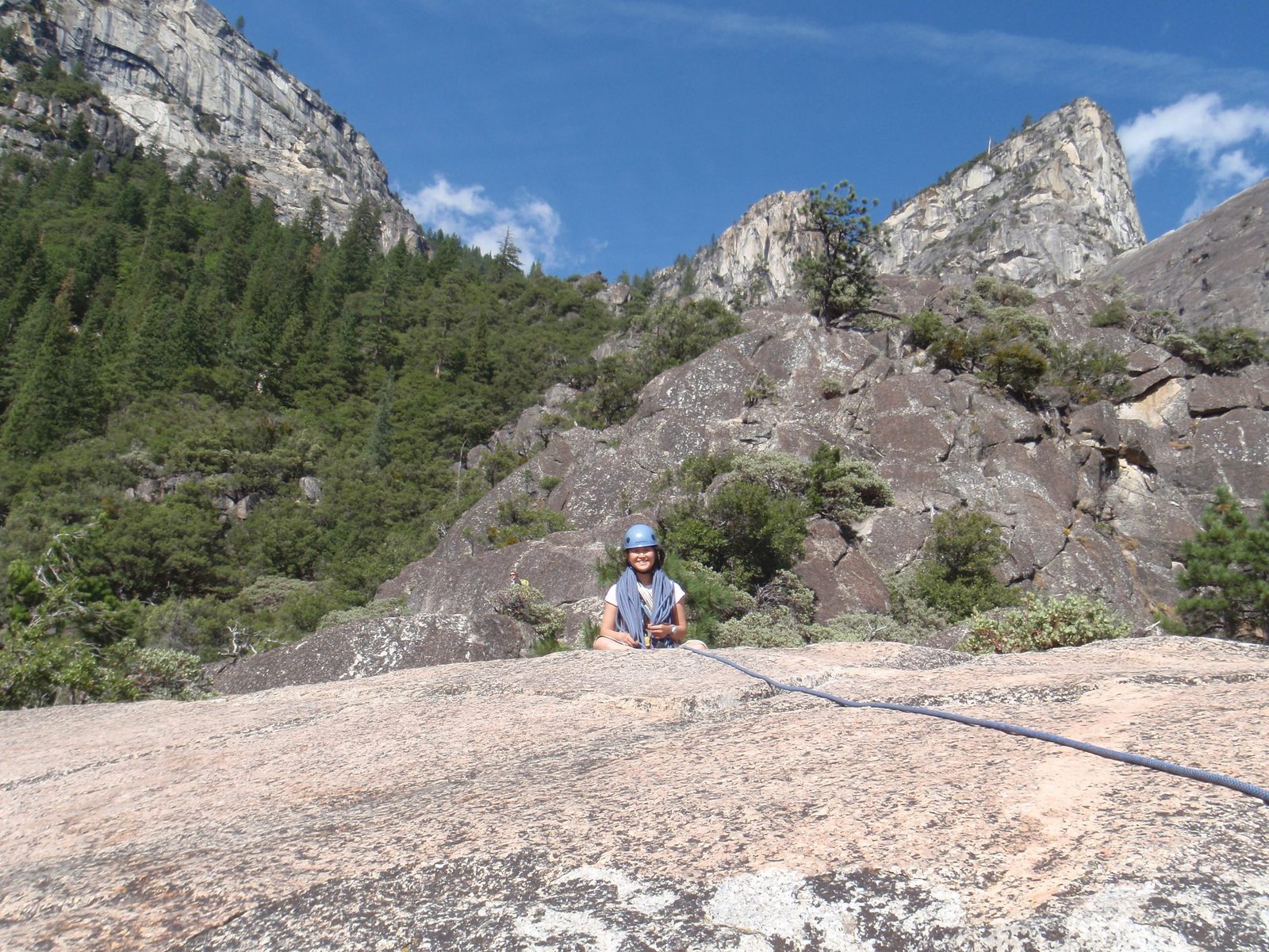 Monica at the top of Manure Pile Buttress.
