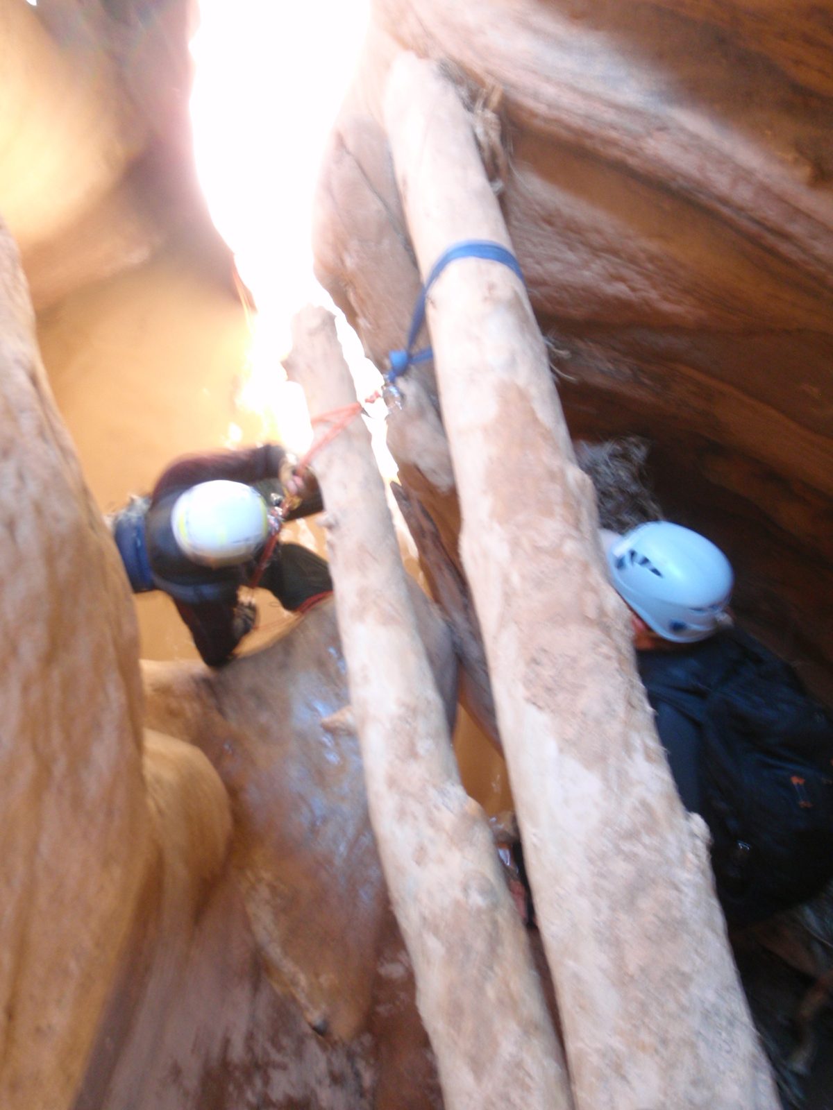 Andy on rappel while Mike looks on in Pine Creek Canyon.