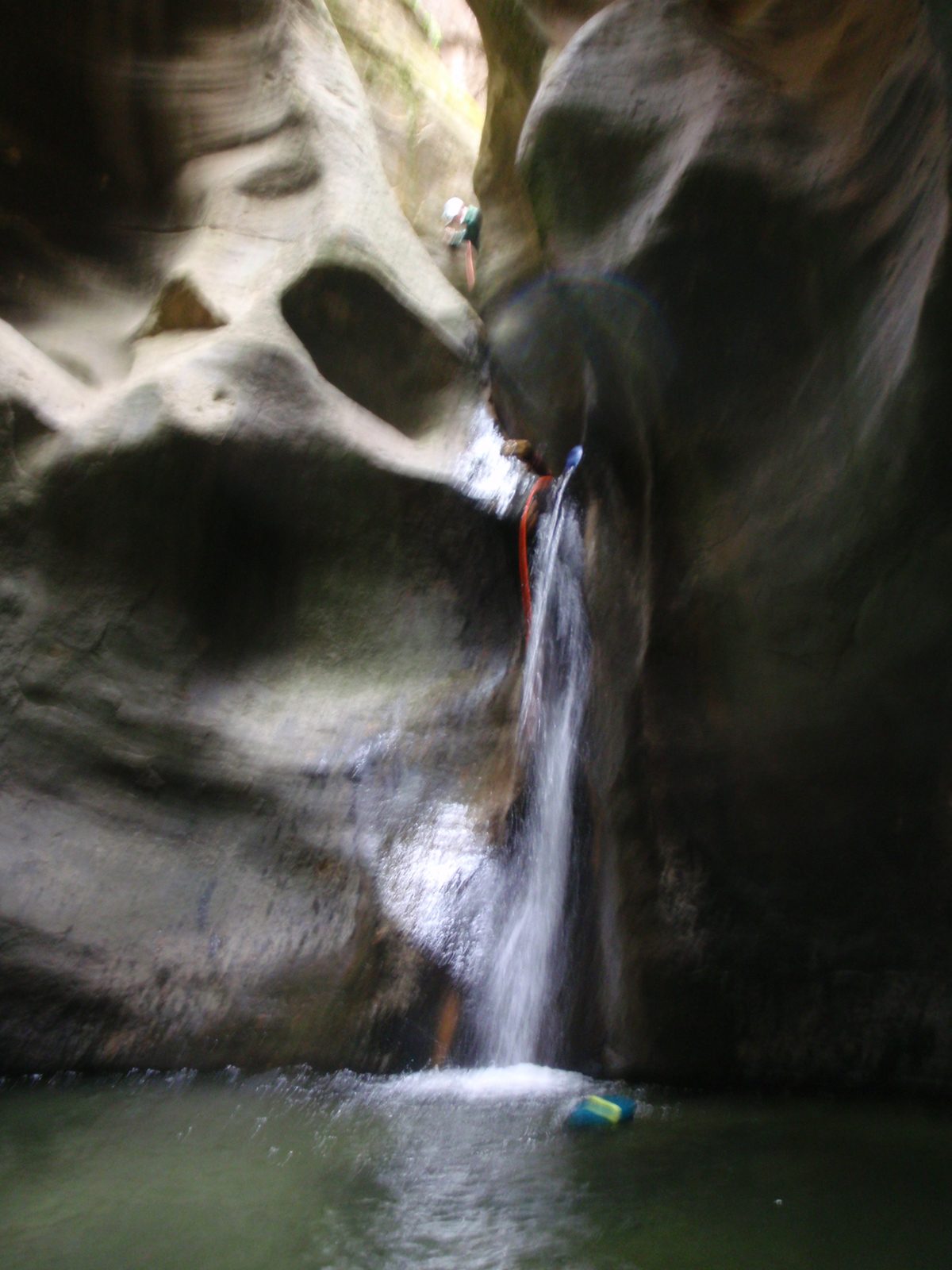 A blurry shot of one of the first small rappels in Kolob Canyon.
