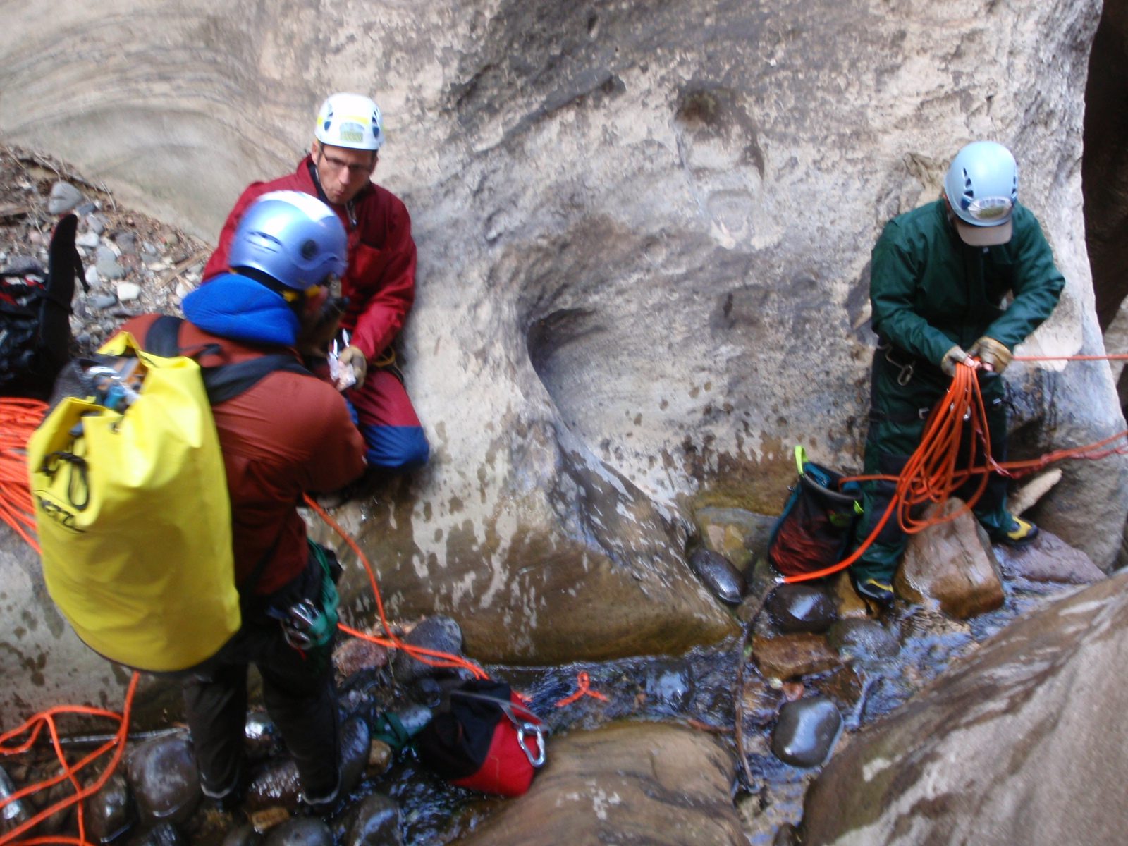 Andy takes a snack break while Mike rigs the next rappel.