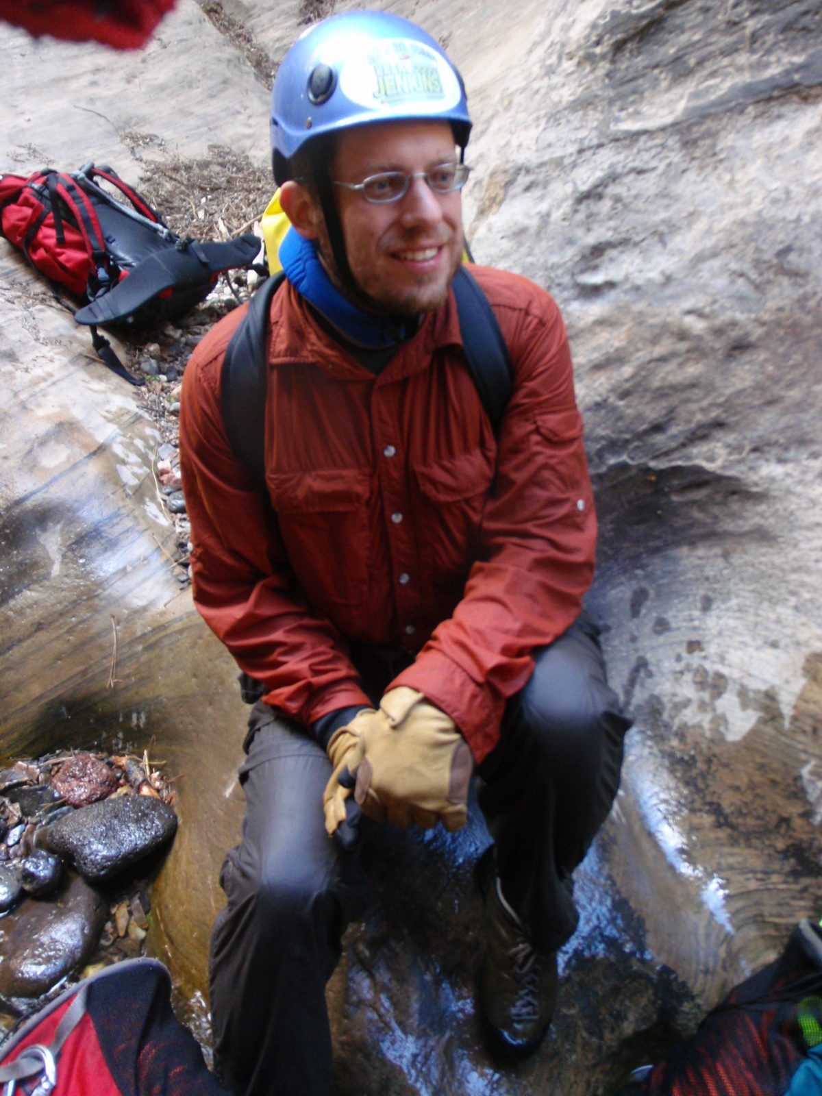 Joel takes a seat while waiting his turn to rappel.