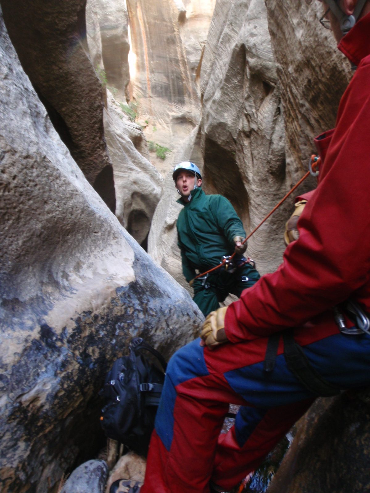 Mike on rappel (green) while Andy watches from above.