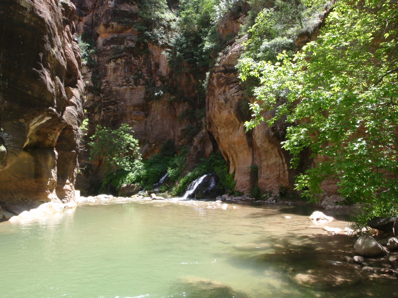 Some small falls join the Virgin River.  At this point the canyon is pretty big and there is...