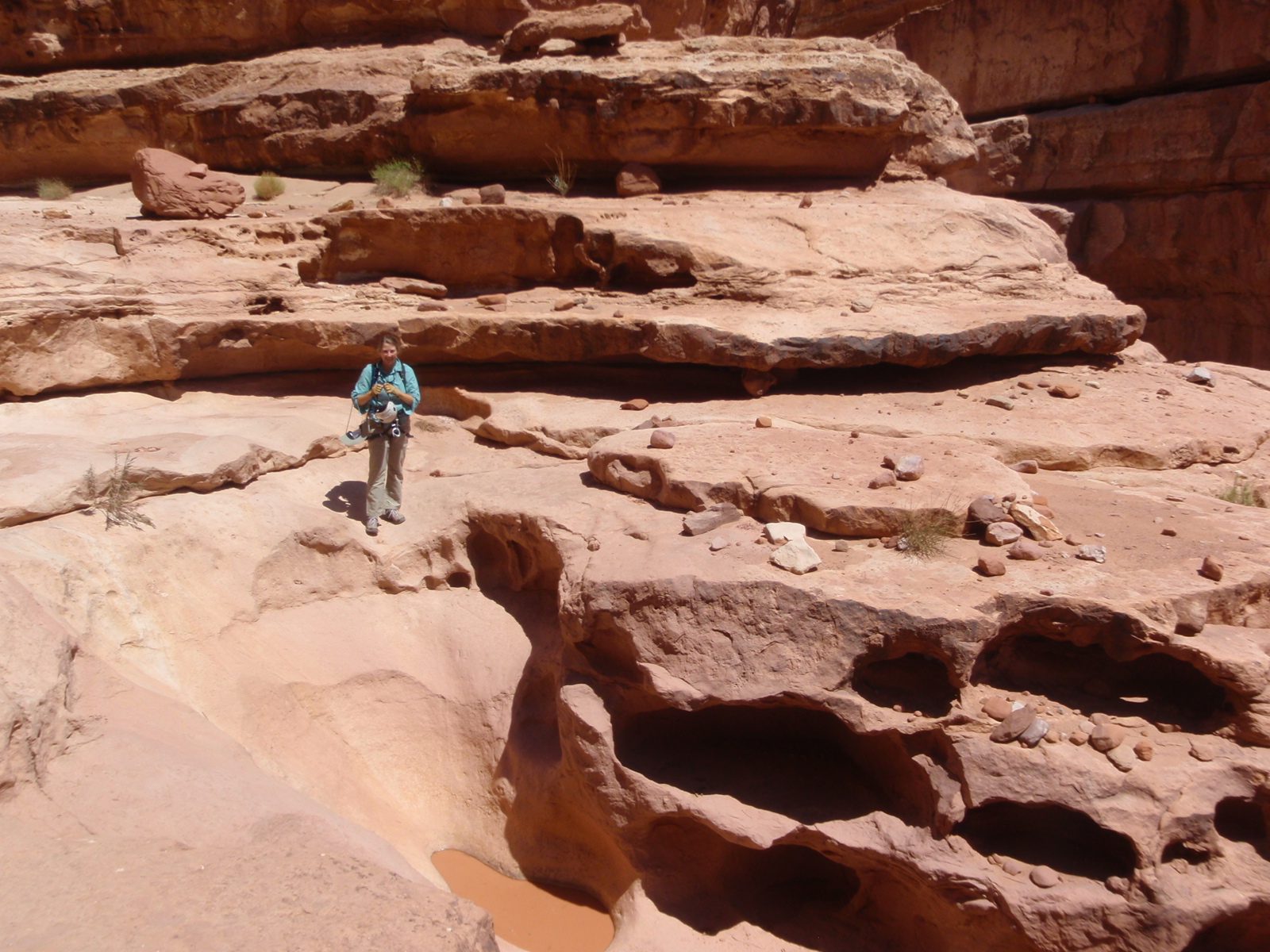 Meredith pauses to take a picture.  This place totally seemed like Fred Flintstone should come...