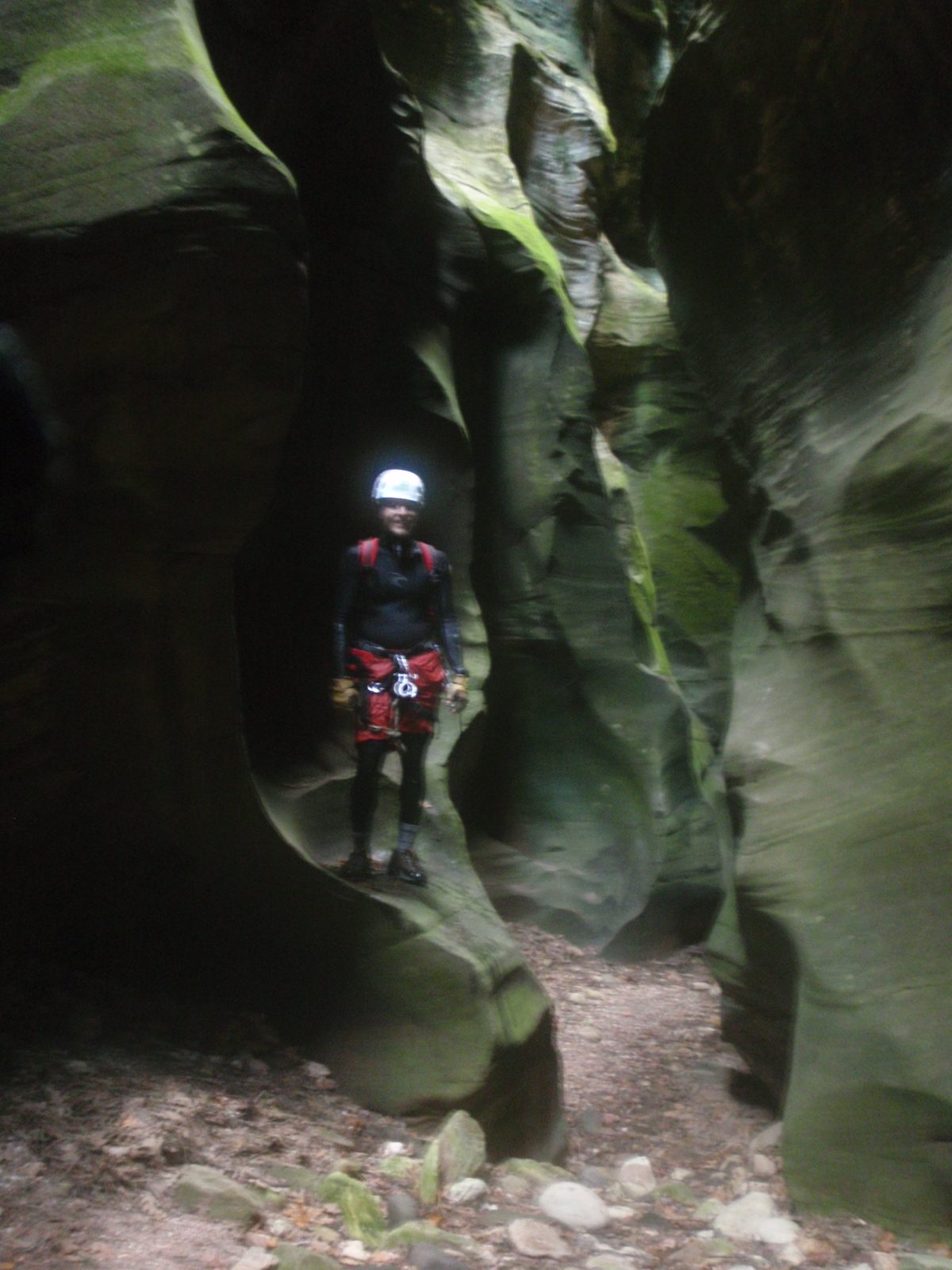 John, standing in a section of narrows in Bear Canyon.