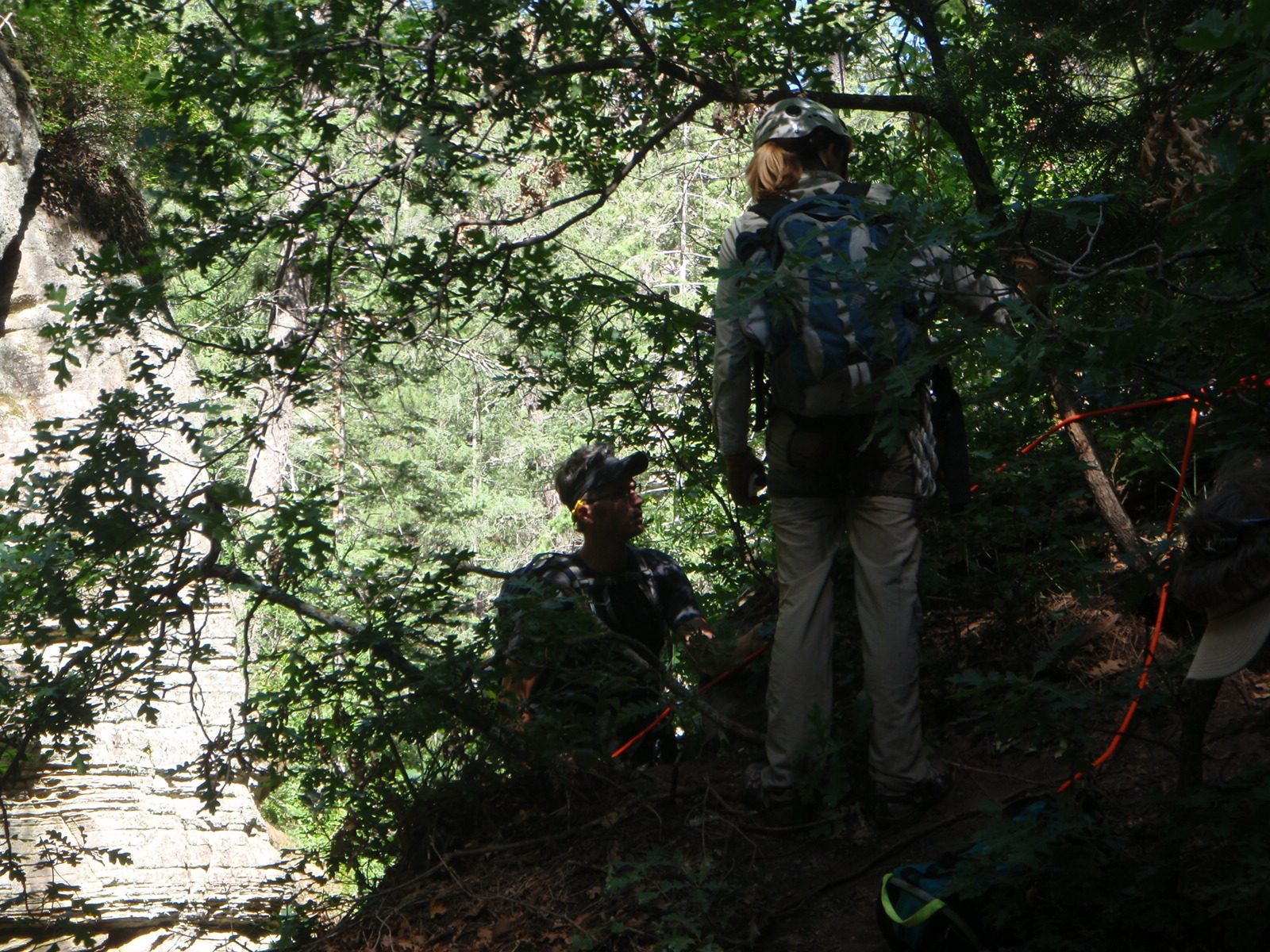 We find the first rappel station.  Also, there is a register!  So we sign it.  Andy rappels...