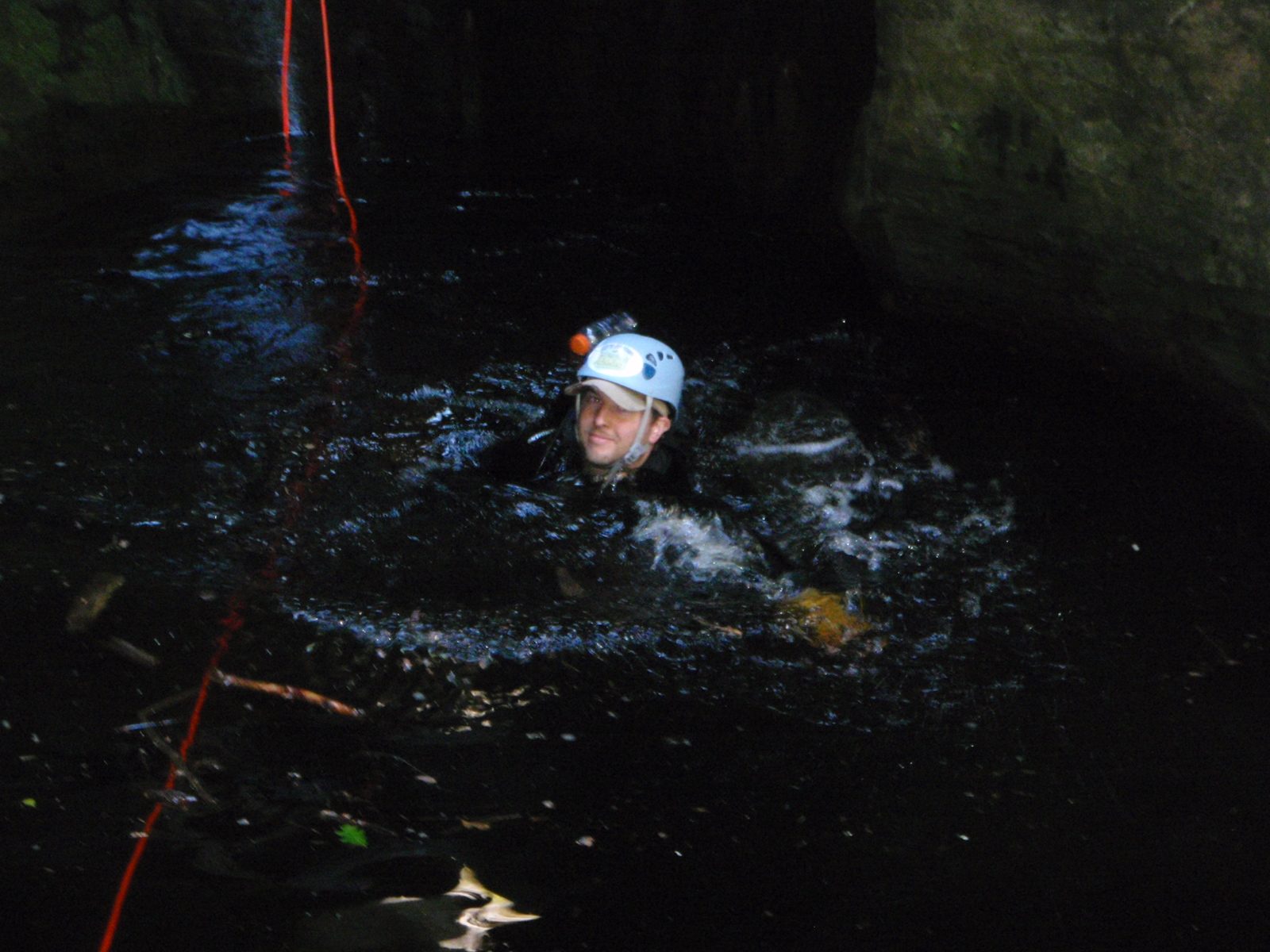 Mike swimming out of the pothole.  We were lucky that the pothole was so full, so exiting was a...