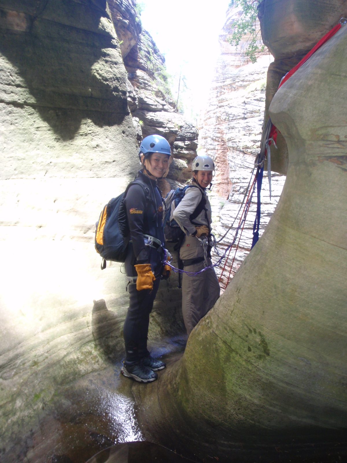 Monica and Meredith, waiting their turn at the top of the 170 foot final rappel.