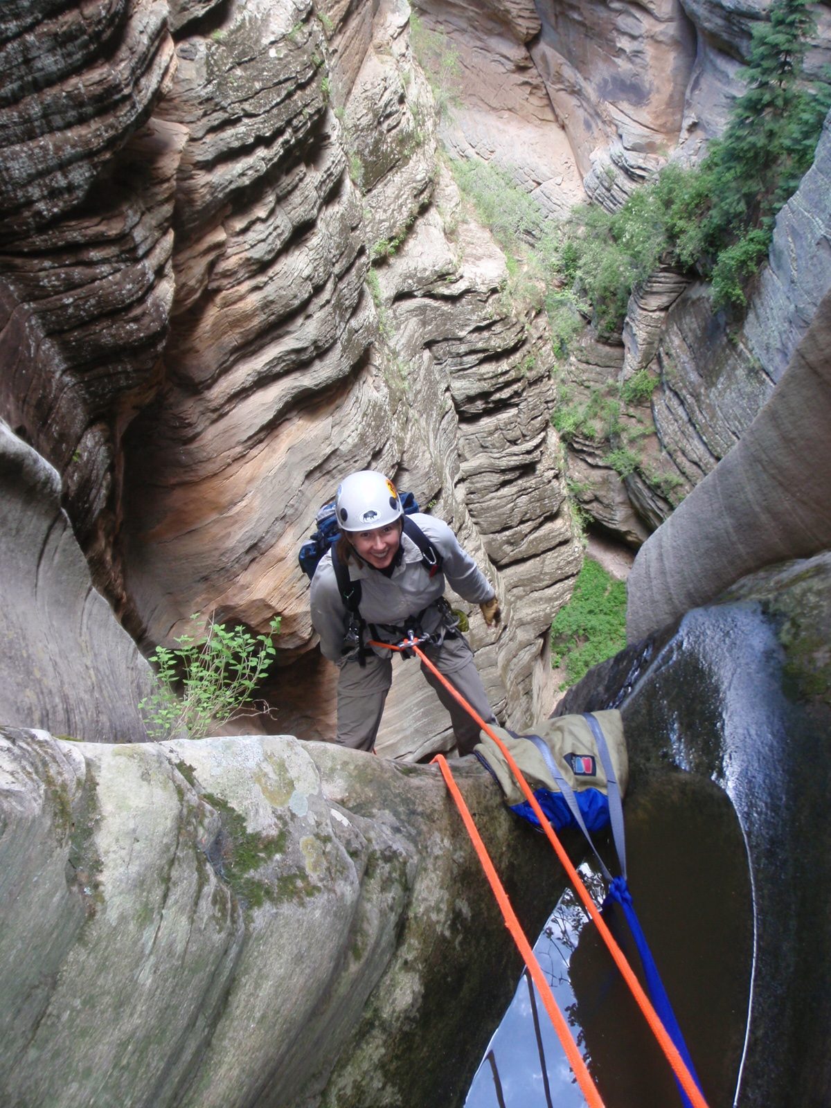 Meredith, starting the 170 foot rappel.  The reason the rope that Meredith is attached to...