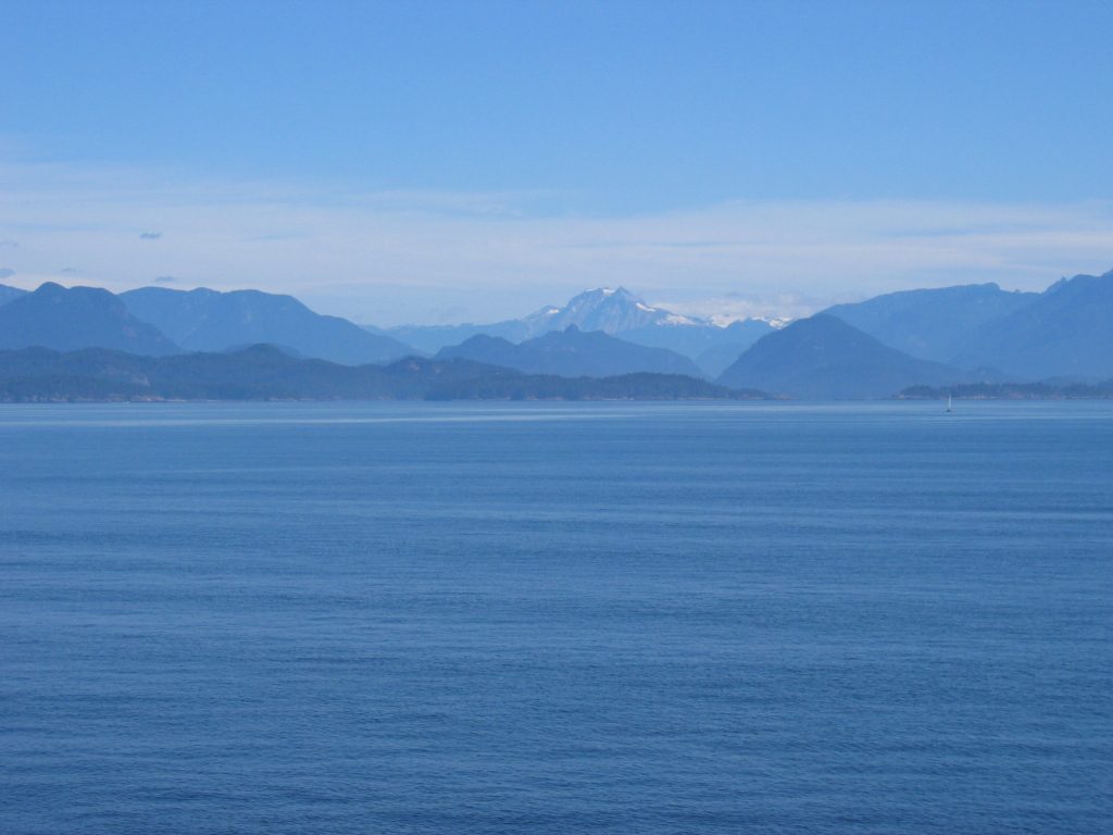 The tallest peak is Mt Baker in Washington State as seen from the Nanaimo to Vancouver ferry