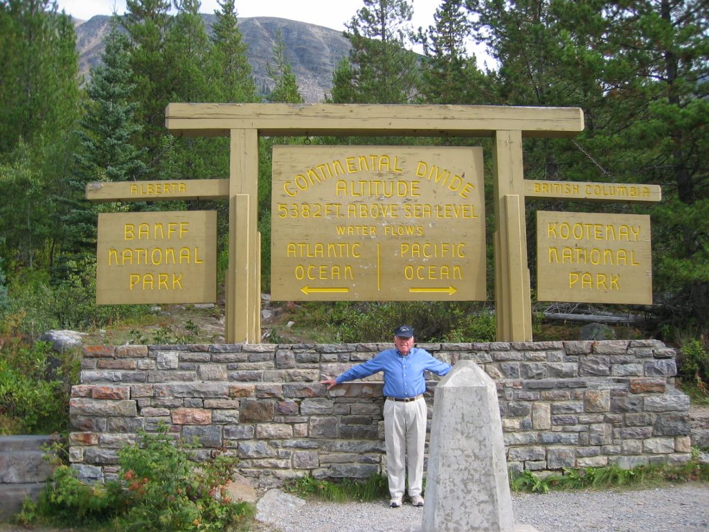 Peter straddling the continental divide in the Kootenai Natl Park