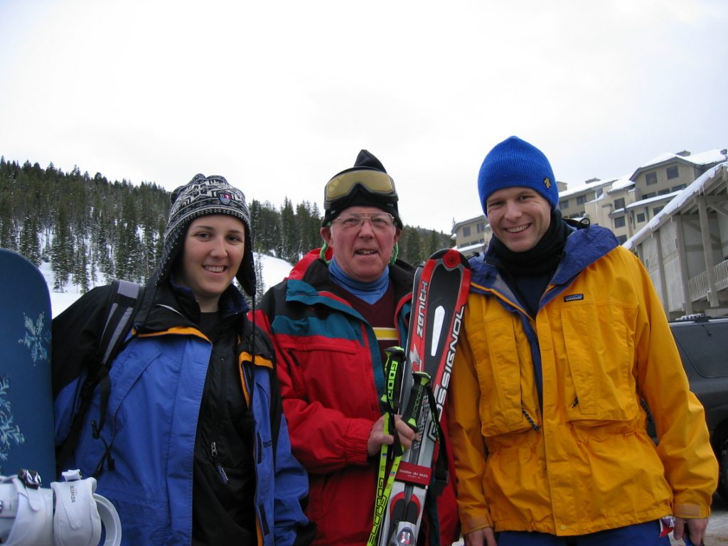 Catherine, Dad, and John get ready for a day on the slopes.