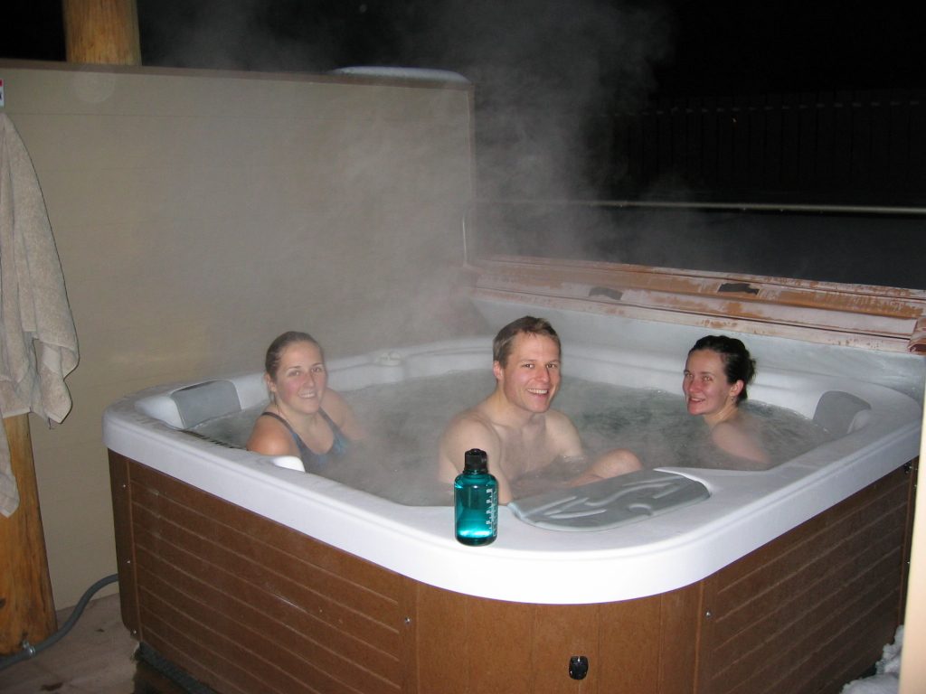 Fortunately, all aches from a day of skiing go away while sitting in a hot tub.