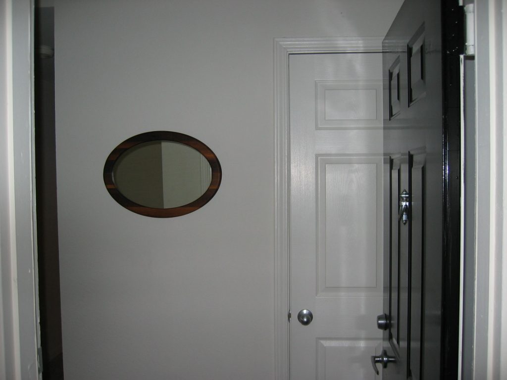 Entrance way with Oval Mirror