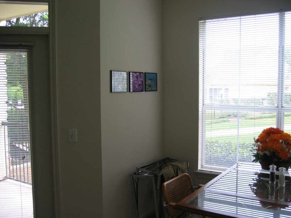 Dining area with three more of Brooke's photos.