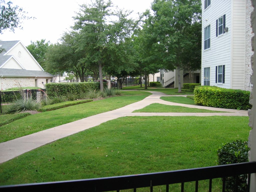 View to the right from the patio, showing other buildings in the complex - beats looking out on...