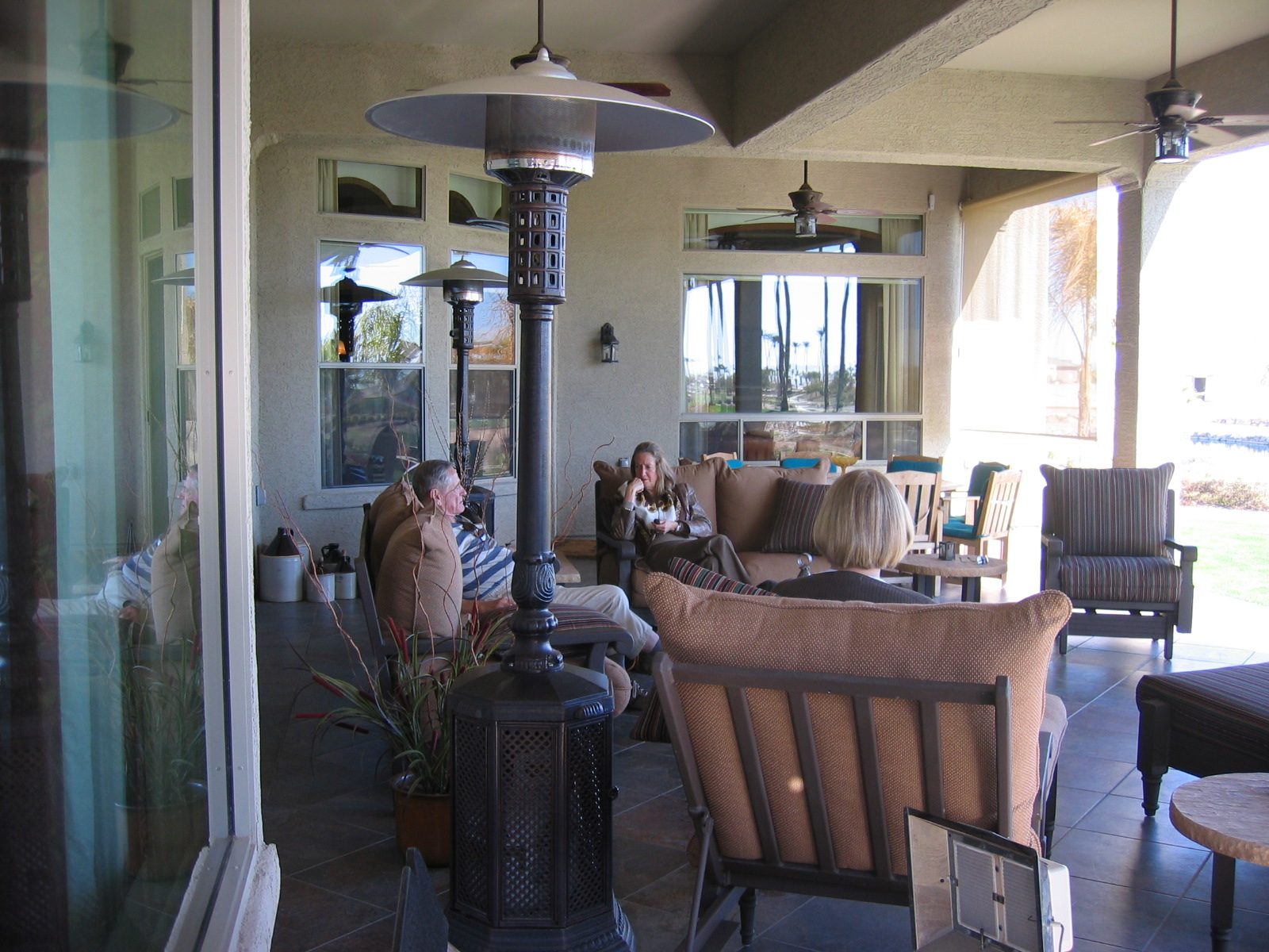 A bigger view of the outdoor living room ... that's the back of Meg's head ... note the new haircut