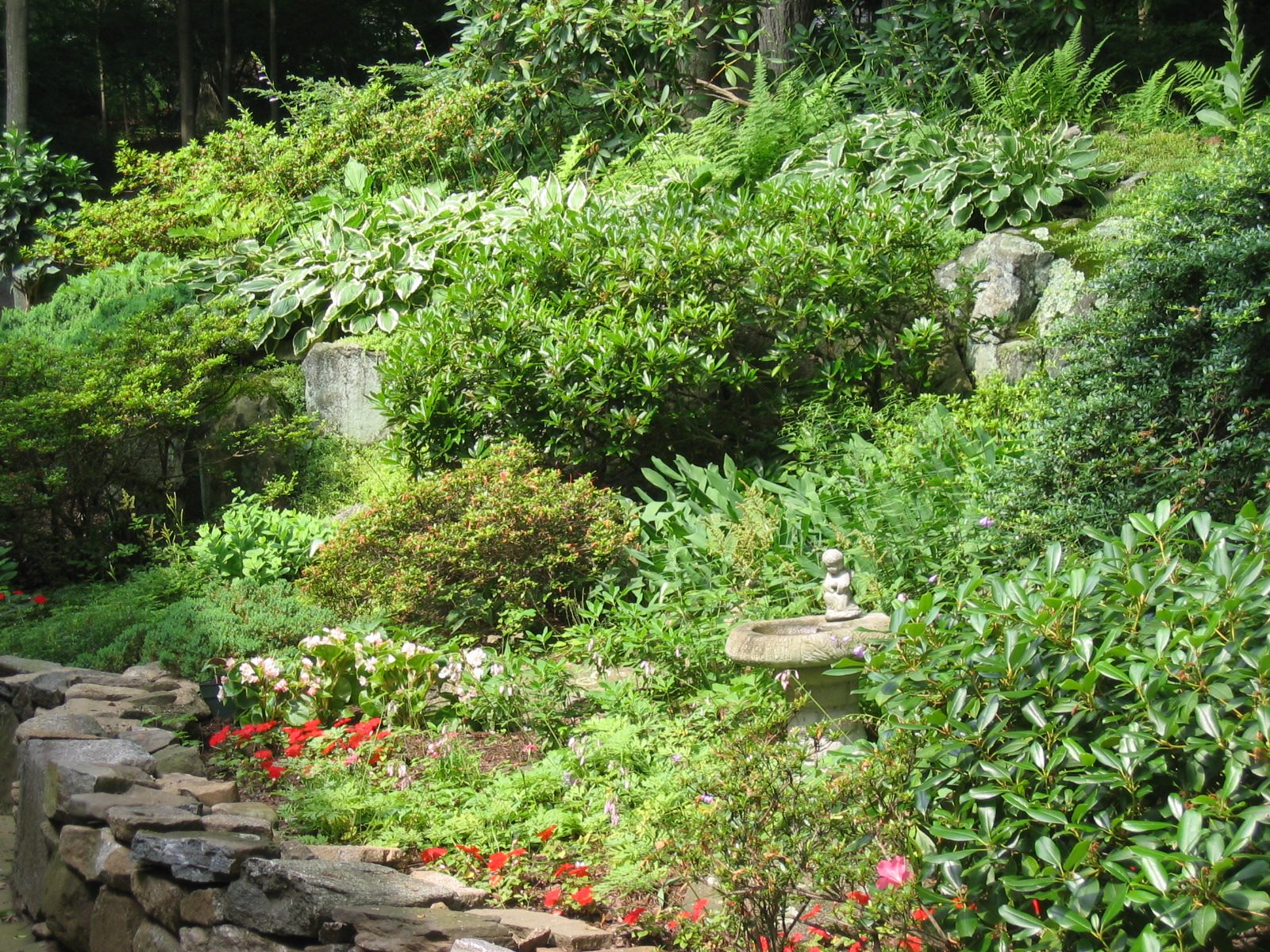 Back around to the stone wall and rock garden