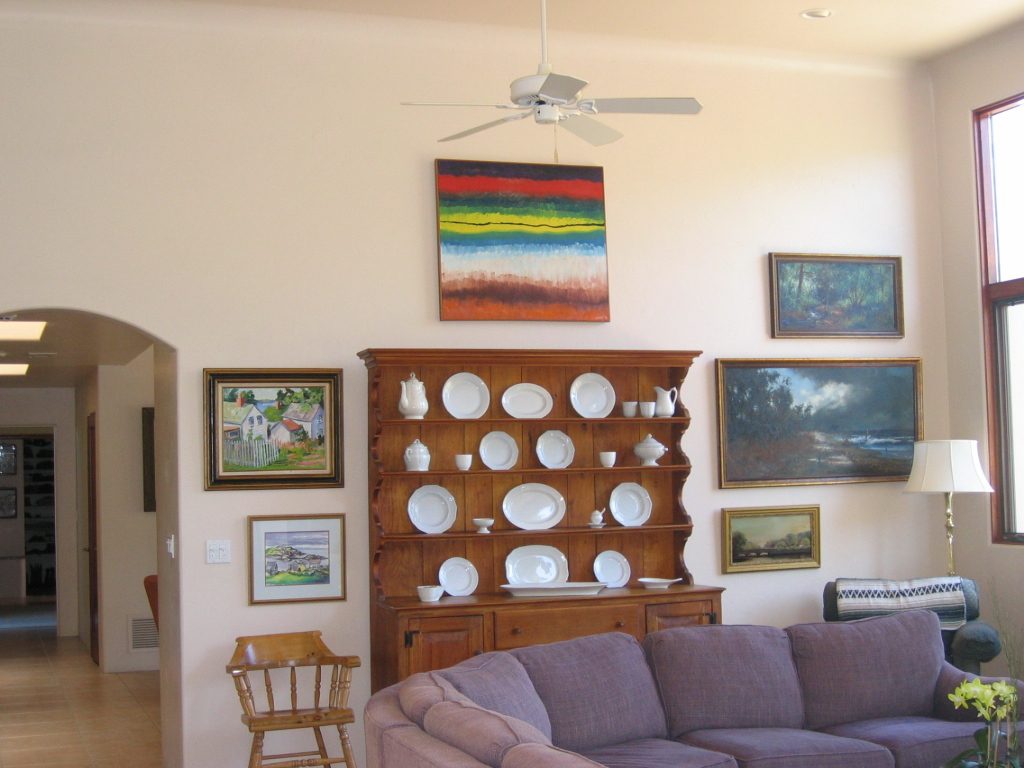 The West wall of the LR.  Still working on the right combo of pictures.  The hutch seems to have...