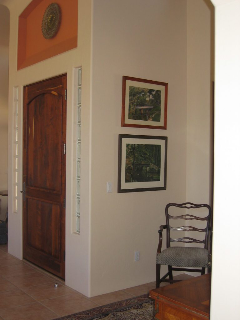 Note pierced metal plate in alcove over door.  Greatly admired by interior consultant.  Both...