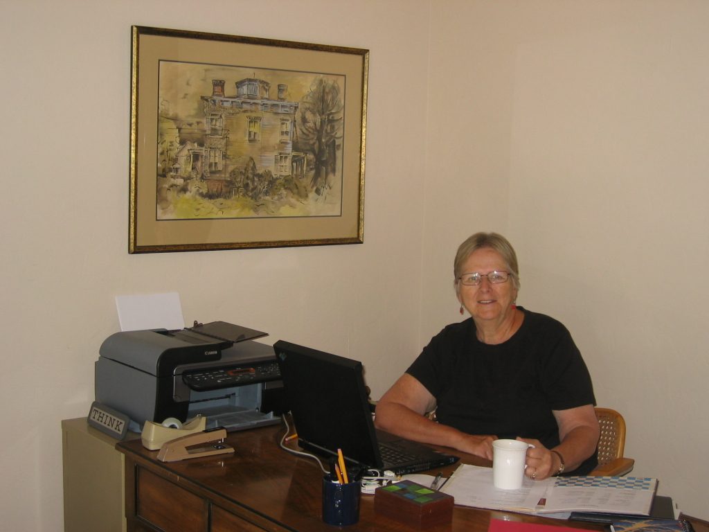 The lady of the house at work in her office.  Notice anything different?