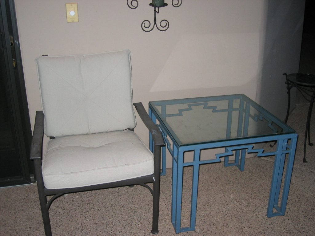 The sixth chair sitting next to one of the original SW tables.  The straight lines are...