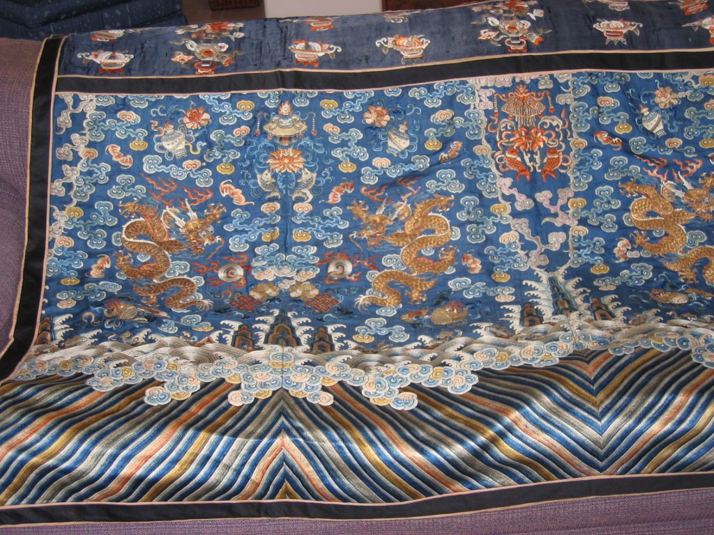 Left half of hanging.  Note that the blue silk background on the top portion is aa different,...