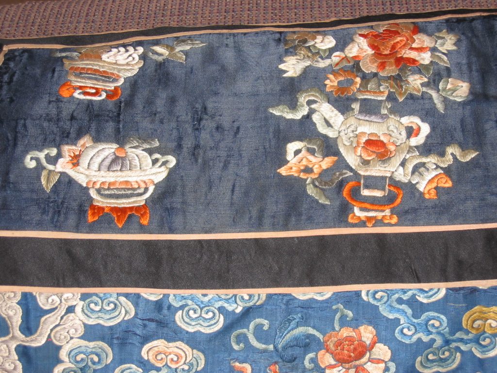 Close up of the top border, which I feel was added later.  The main piece seems to be all...