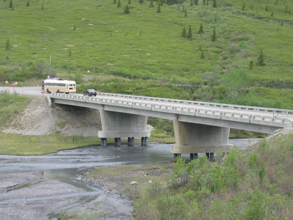 A bridge for Catherine, across the braided river.  That's a different school bus in front of us.