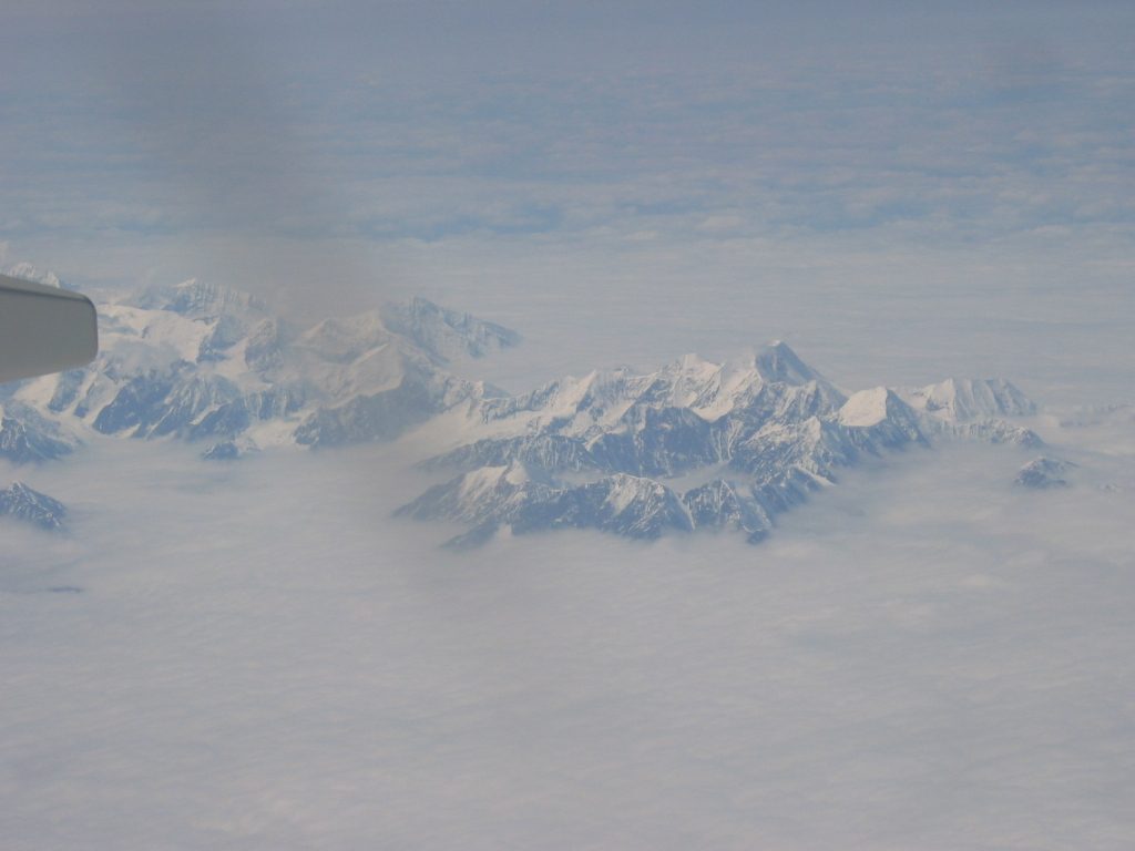 Getting closer, seeing some of the seven peaks that surround McKinley