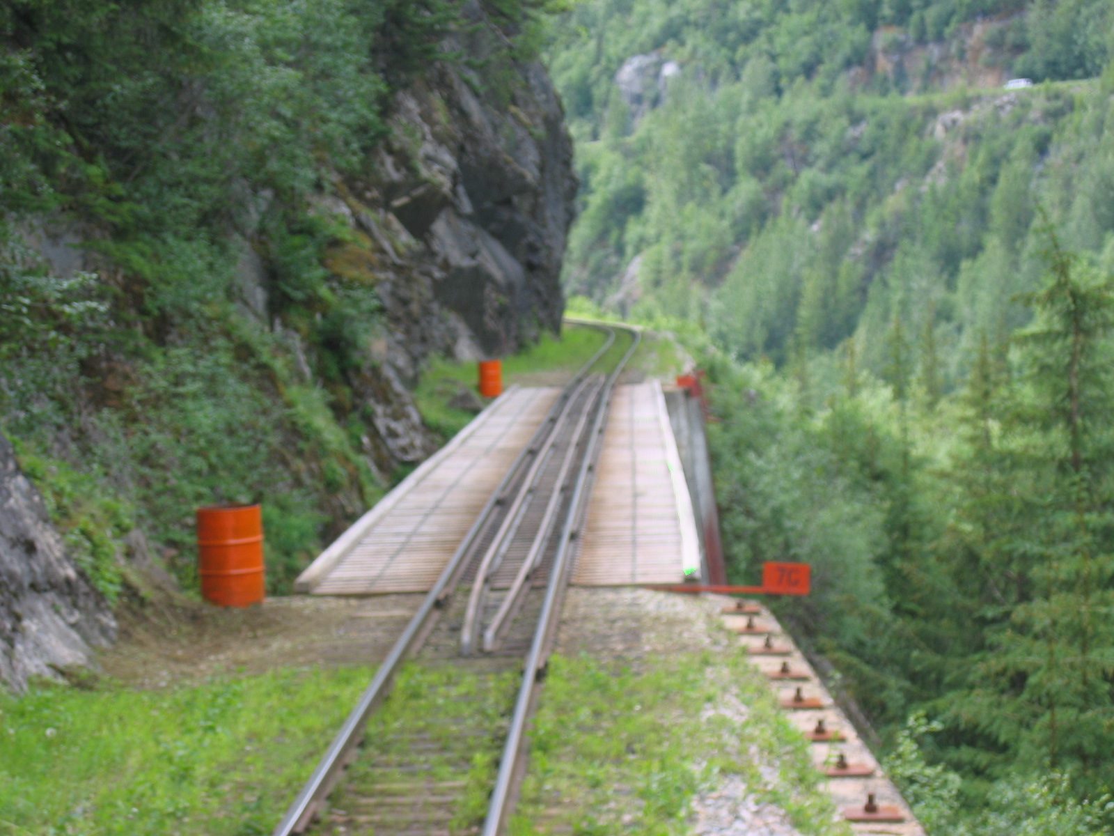 Not sure how deep that ravine is, but there's a bridge across it.  You can get some sense of the...