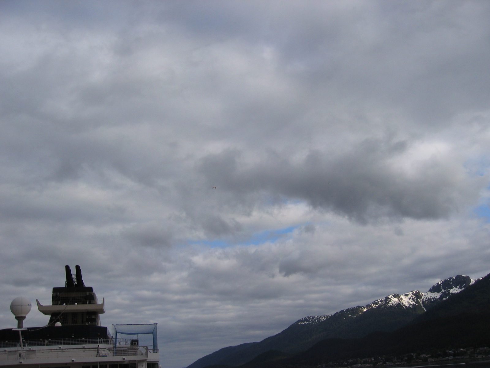 ... fairly high in the clouds (about dead center of picture)