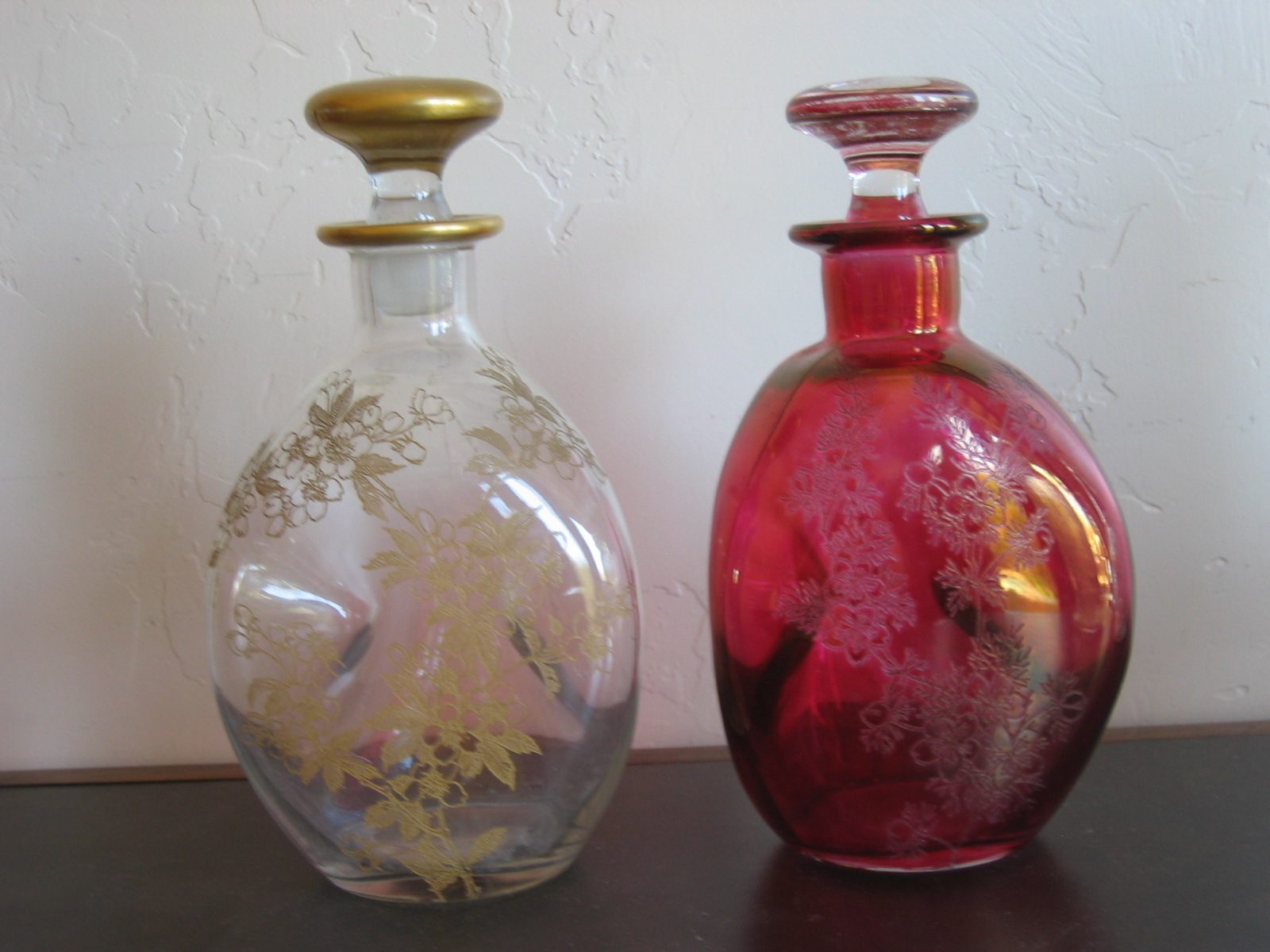 Two decanters ... date from the 1950's ... gold etching