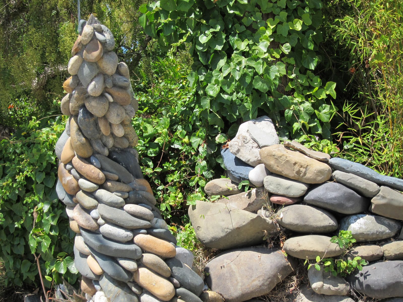 .. and another forming the end of a stone fence.  Assume there is some concrete holding these...