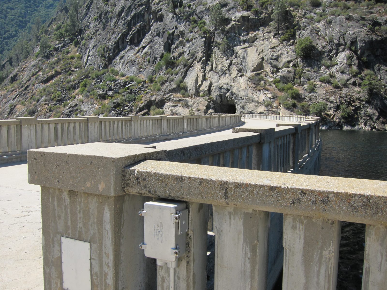 Dad liked this view of the road across the dam disappearing into the tunnel.