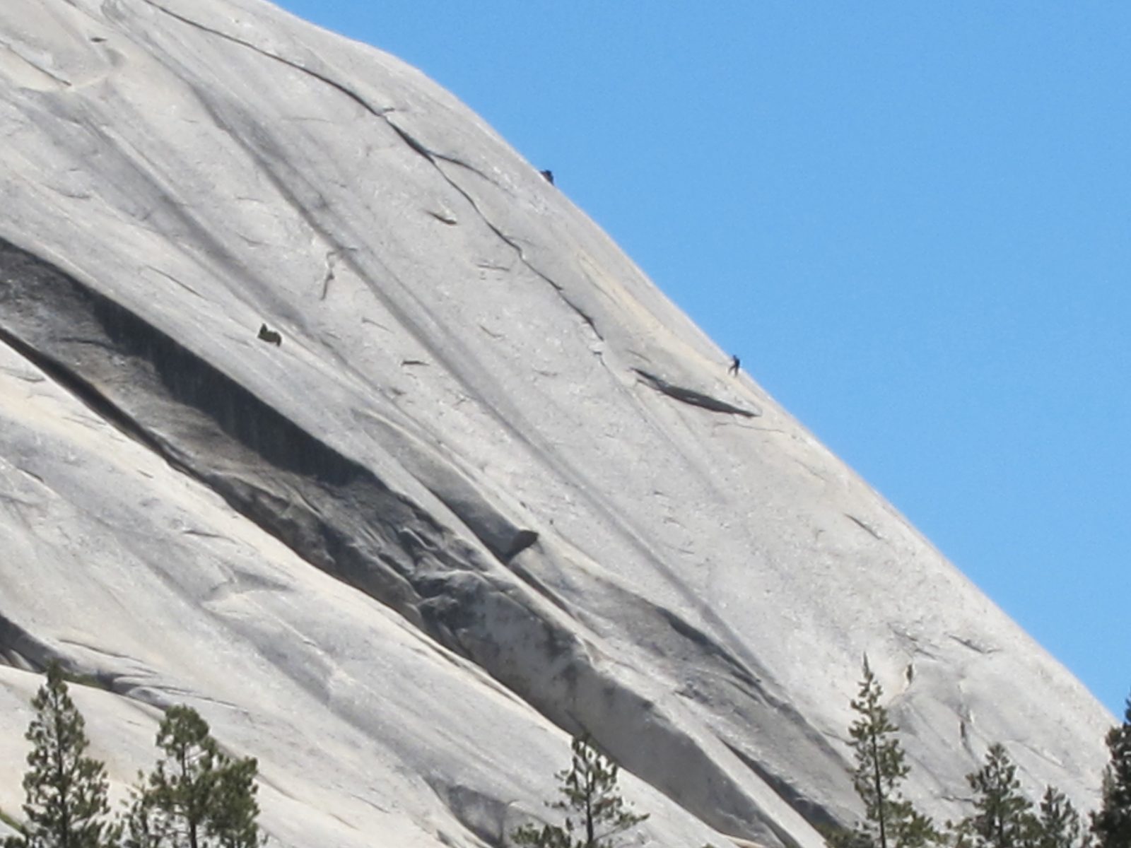 Climbers on a nearby rock.  Not sure which one.