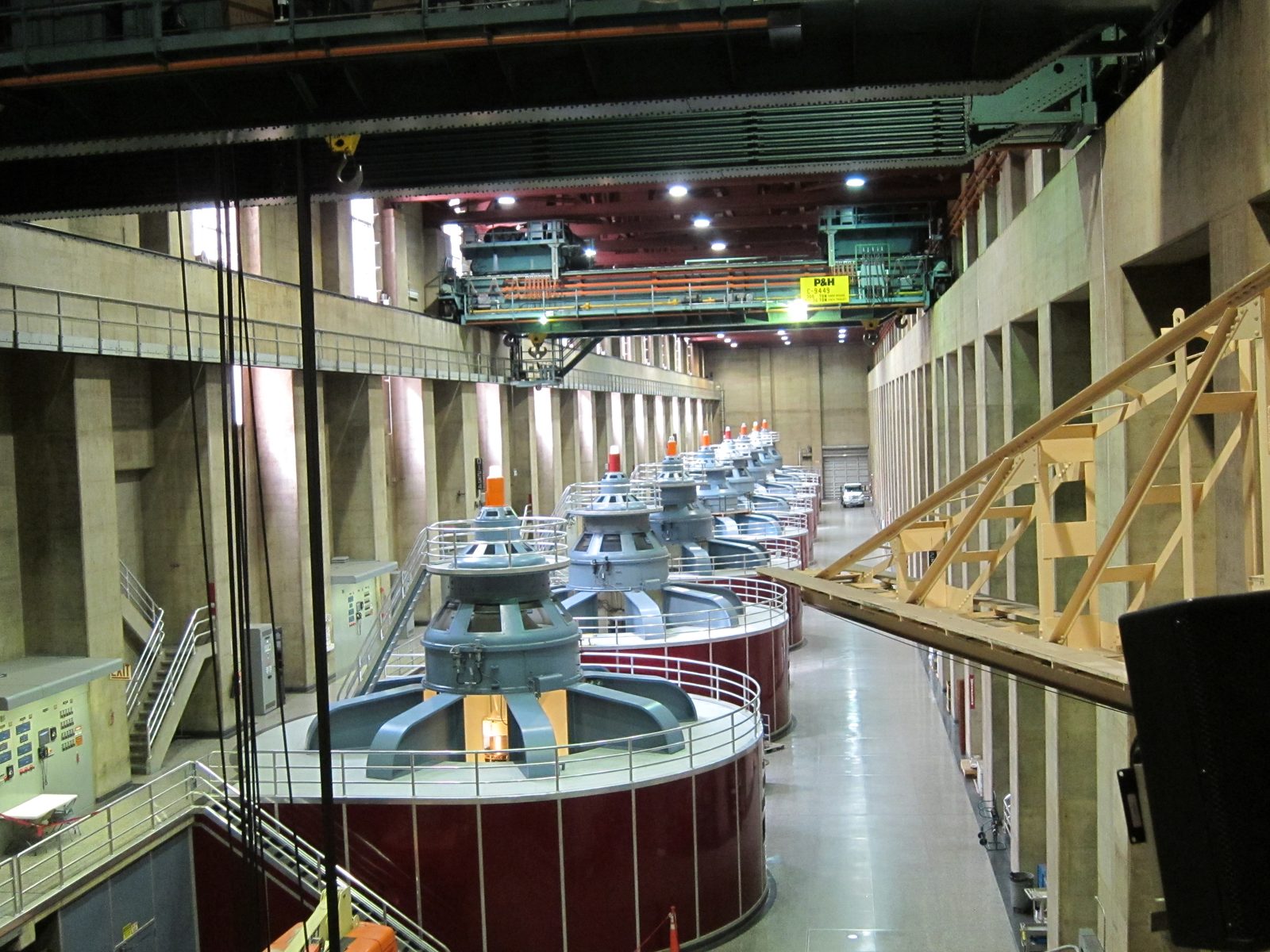 A view of eight of the generators; there are 17  total.  Note the overhead cranes used to lower...
