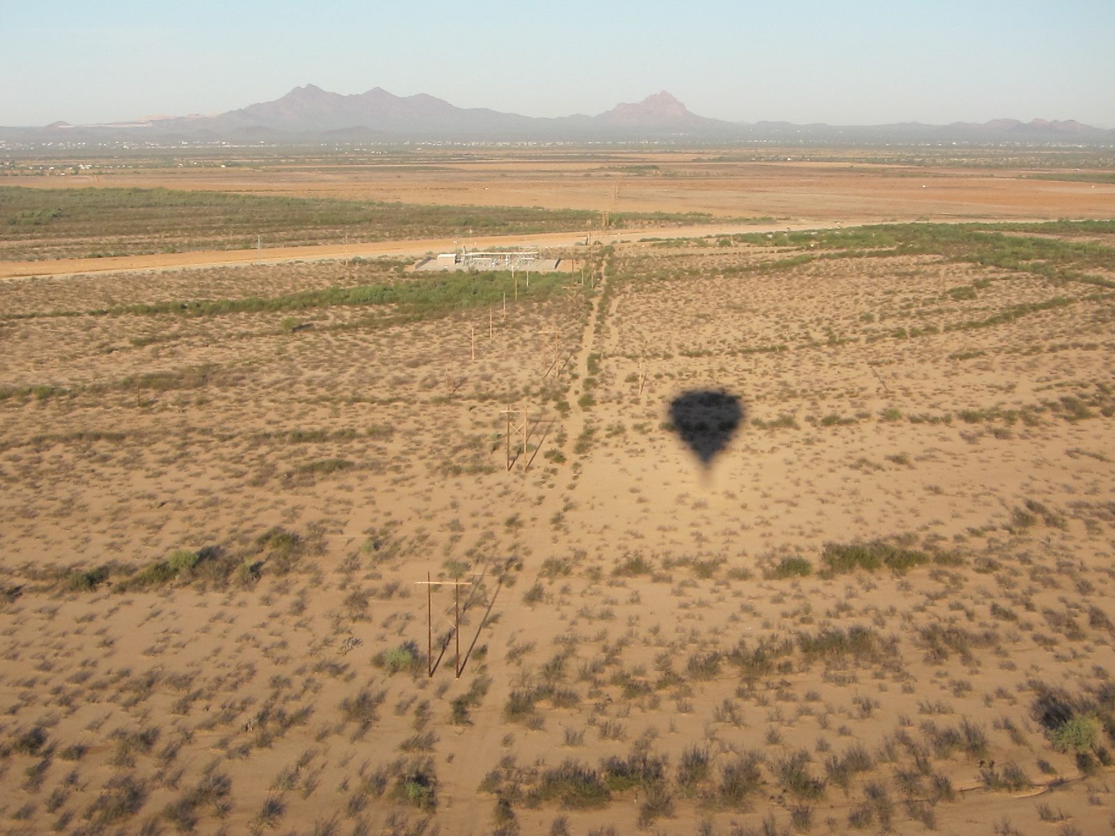 More of the land we were crossing with our own shadow.